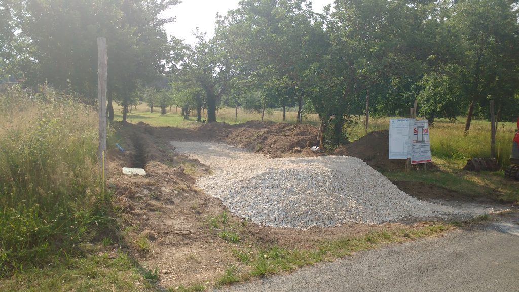Pictured is my gravel driveway being built