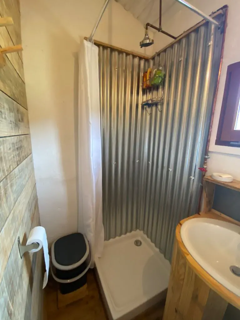 Pictured is my tiny house shower that was made from galvanised corrugated steel sheets