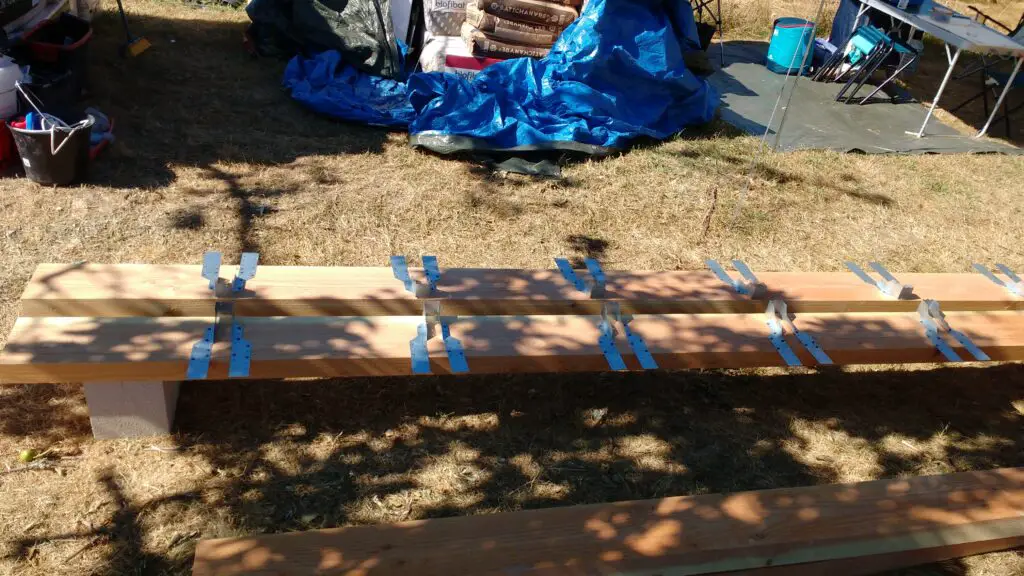 Pictured are the tiny house joist hangers attached to the floor beams